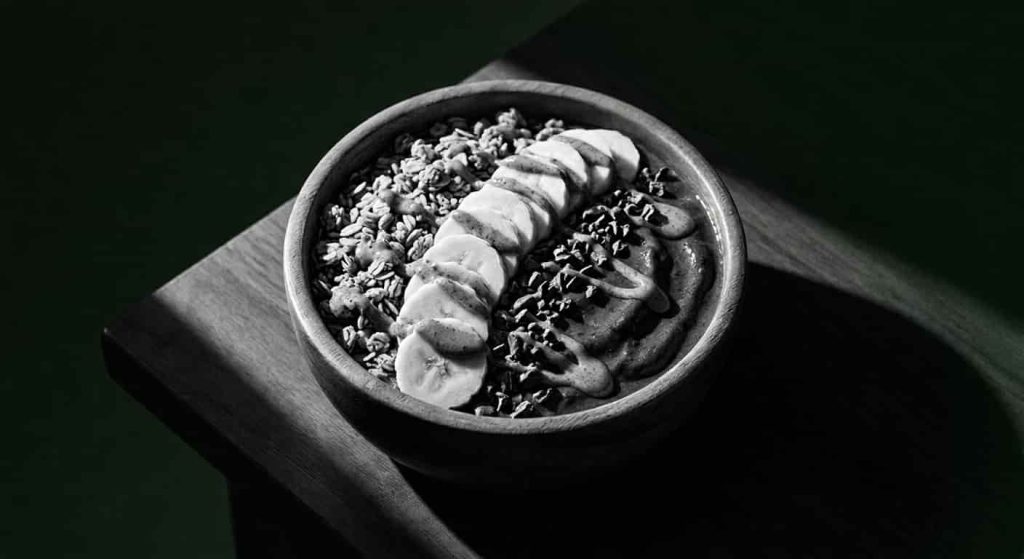 Palmetto superfoods açaí bowl with banana granola cacao nibs and almond butter